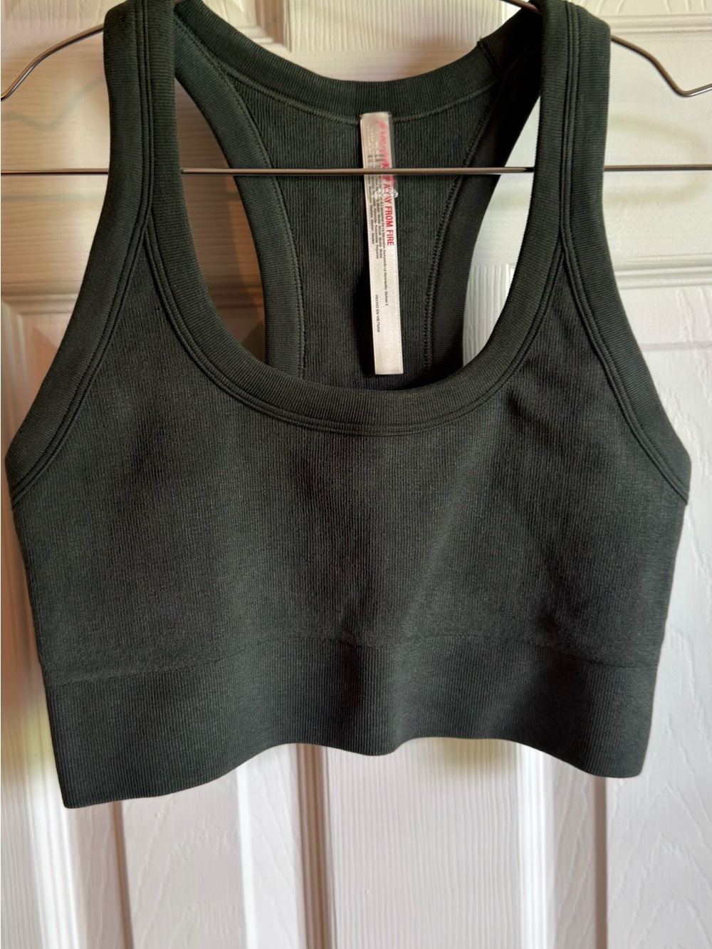FP Movement by Free People Ribbed Racerback Sports Bra in Dark Green